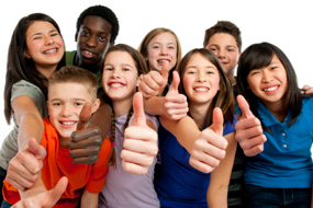 Teens cheering with thumbs up