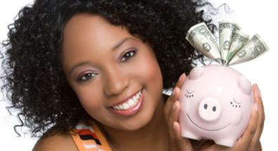 Image of a teen holding a piggy bank