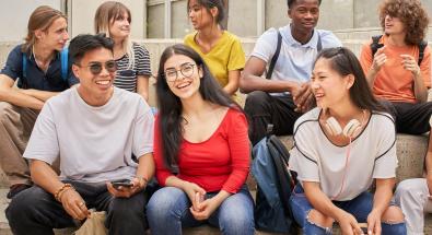 Image of 8 youth sitting and talking